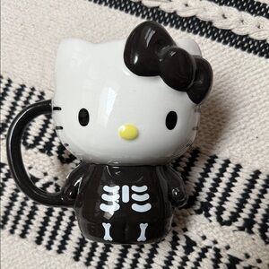 Hello Kitty Black & White Skeleton Ceramic Mug with Yellow Nose
